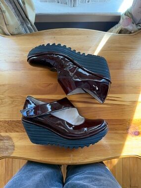Fly London Women's Patent Burgundy Platform Wedges